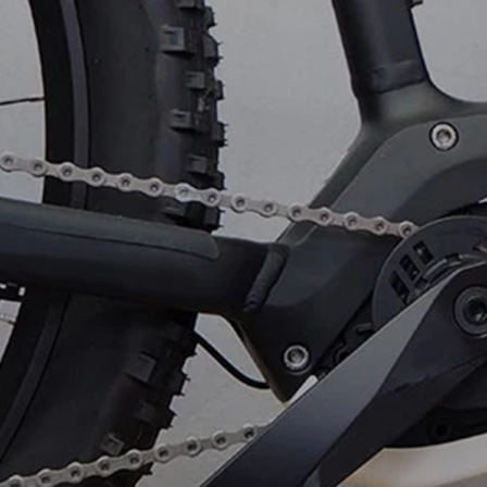 A close-up image depicting an electric bicycle's chain